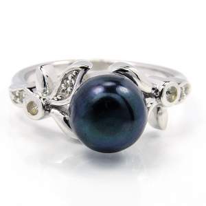 Серебряное кольцо 925 пробы 3,88 гр. с черным жемчугом Камока острове Таити и топазами из США 3,41 карат