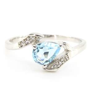 Серебряное кольцо 925 пробы 1,97 гр. со швейцарским топазом из США и белыми топазами 0,55 карат