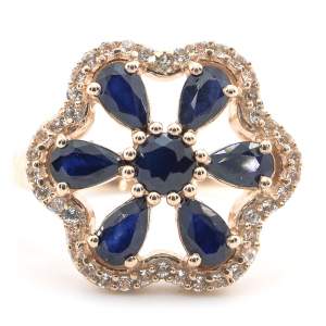 Серебряное кольцо 925 пробы в позолоте 750 пробы 4,65 гр. со шри-ланкийскими голубыми сапфирами класса AAA и топазами из США 2,09 карат