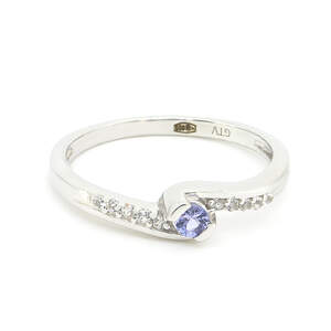 Серебряное кольцо 925 пробы 1,86 г с танзанитом класса АААА и белыми топазами с США 0,21 карат