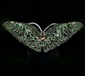 Серебряное брошь 925 пробы 22,15 г с зелеными Альпінітами и цирконами 13,2 карат