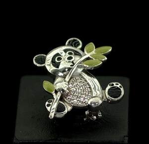 Серебряная брошь 925 пробы 5,3 г с цирконами та эмалью 0,7 карат