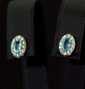 Серебряные серьги 925 пробы 2,11 г с голубыми Топазами и фианитами 1,33 карат