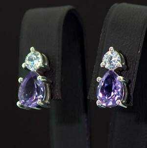 Серебряные серьги 925 пробы 3,72 г с бразильскими Аметистами и фианитами 2,94 карат Серебряные серьги 925 пробы 3,72 г с бразильскими Аметистами и фианитами 2,94 карат
