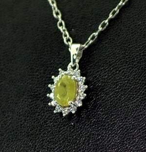 Серебряная подвеска 925 пробы 1,2 гр. с норвежским Сфеном класса АААА и топазами из США 1,27 карат