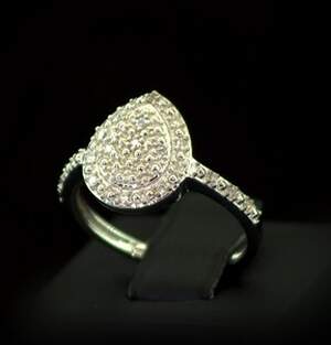 Серебряное кольцо 925 пробы 3,61 гр. с белыми африканскими бриллиантами VVS1 0,16 карат Серебряное кольцо 925 пробы 3,61 гр. с белыми африканскими бриллиантами VVS1 0,16 карат