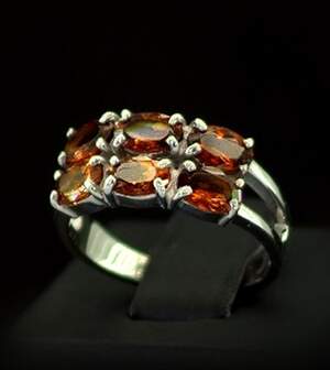 Серебряное кольцо 925 пробы 3,66 г с мандариновими Гранатами 2,82 карат Серебряное кольцо 925 пробы 3,66 г с мандариновими Гранатами 2,82 карат
