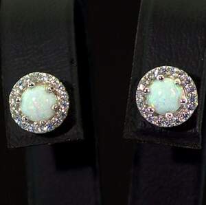 Серебряные серьги 925 пробы 2,31 г с гидротермальными Опалами и цирконами 0,85 карат Серебряные серьги 925 пробы 2,31 г с гидротермальными Опалами и цирконами 0,85 карат