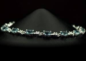 Серебряный браслет 925 пробы 7,37 г с Топазами Лондон Блу со США та цирконами 4,76 карат 17-20 см Серебряный браслет 925 пробы 7,37 г с Топазами Лондон Блу со США та цирконами 4,76 карат 17-20 см