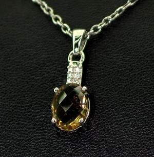 Серебряная подвеска 925 пробы 1,59 г с турецким Султанітом класса АААА и цирконами 2,48 карат Серебряная подвеска 925 пробы 1,59 г с турецким Султанітом класса АААА и цирконами 2,48 карат