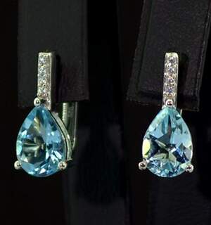 Серебряные серьги 925 пробы 3,54 г с голубыми Топазами и цирконами 4,51 карат Серебряные серьги 925 пробы 3,54 г с голубыми Топазами и цирконами 4,51 карат