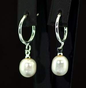 Серьги у покрытии родием з Перлинами 6,8 карат Серьги у покрытии родием з Перлинами 6,8 карат