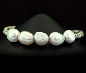 Серебряный браслет 925 пробы 8,1 г с таїтянськими Перлинами барглаз та цирконами Серебряный браслет 925 пробы 8,1 г с таїтянськими Перлинами барглаз та цирконами