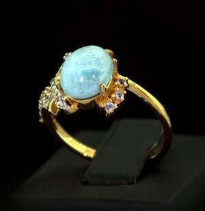 Серебряное кольцо 925 пробы 3,06 гр. с доминиканским Ларимаром, Танзанитами класса АААА и топазами из США 3,47 карат Серебряное кольцо 925 пробы 3,06 гр. с доминиканским Ларимаром, Танзанитами класса АААА и топазами из США 3,47 карат
