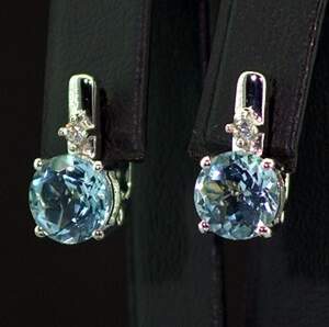 Серебряные серьги 925 пробы 3,92 г с голубыми Топазами и цирконами 4,79 карат Серебряные серьги 925 пробы 3,92 г с голубыми Топазами и цирконами 4,79 карат